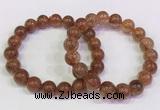 CGB4621 10mm - 11mm round golden rutilated quartz beaded bracelets