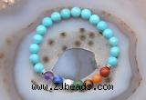 CGB6497 8mm round blue howlite 7 chakra beads bracelet wholesale