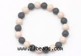 CGB8073 8mm white fossil jasper & black lava beaded stretchy bracelets