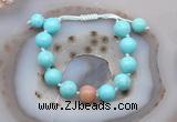 CGB9605 12mm round blue howlite & moonstone adjustable bracelets