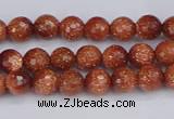 CGS470 15.5 inches 4mm faceted round goldstone beads wholesale