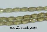 CLQ10 15.5 inches 6*10mm faceted rice natural lemon quartz beads