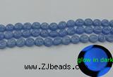 CLU131 15.5 inches 10mm flat round blue luminous stone beads