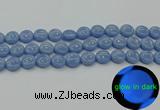 CLU132 15.5 inches 12mm flat round blue luminous stone beads