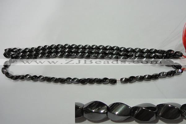 CMH151 15.5 inches 5*8mm twisted rice magnetic hematite beads