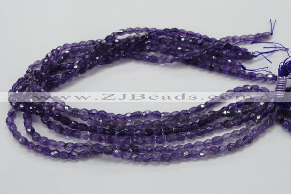 CNA50 15.5 inches 6*7mm faceted rice grade A natural amethyst beads