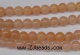 CPE02 15.5 inches 6mm round peach stone beads wholesale