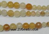 CRO726 15.5 inches 6mm – 14mm faceted round yellow jade beads