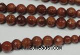 CRO736 15.5 inches 6mm – 14mm faceted round goldstone beads