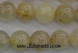 CRU583 15.5 inches 10mm round golden rutilated quartz beads