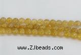 CRU661 15.5 inches 10mm round golden rutilated quartz beads