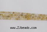 CRU666 15.5 inches 4mm faceted round golden rutilated quartz beads