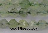 CRU791 15.5 inches 6mm faceted nuggets green rutilated quartz beads