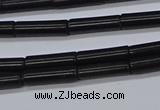CTB318 15.5 inches 4*13mm tube black stone beads wholesale
