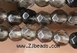 CTG2506 15.5 inches 4mm faceted round smoky quartz beads