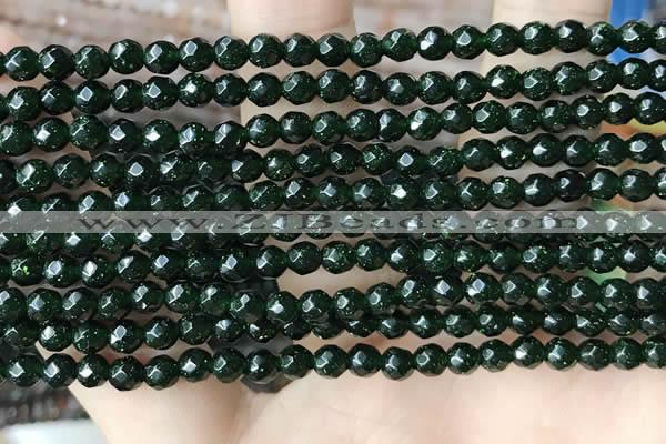 CTG3591 15.5 inches 4mm faceted round green goldstone beads