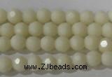 CTU1440 15.5 inches 4mm faceted round synthetic turquoise beads