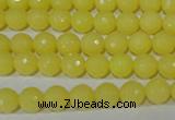 CTU2523 15.5 inches 4mm faceted round synthetic turquoise beads