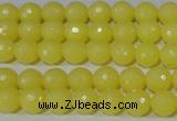 CTU2524 15.5 inches 6mm faceted round synthetic turquoise beads