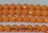 CTU2540 15.5 inches 6mm faceted round synthetic turquoise beads