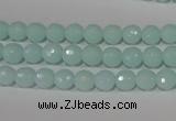 CTU2572 15.5 inches 6mm faceted round synthetic turquoise beads