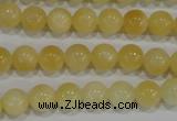 CYJ161 15.5 inches 8mm round yellow jade beads wholesale