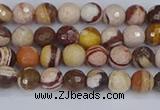 CZJ278 15.5 inches 4mm faceted round zebra jasper beads