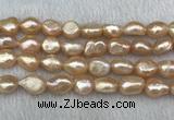 FWP290 15 inches 10mm - 11mm baroque pink freshwater pearl strands
