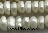 FWP321 14.5 inches 5mm - 6mm button white freshwater pearl strands