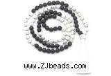 GMN8635 8mm, 10mm white howlite & black lava 108 beads mala necklace with tassel