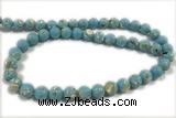 TURQ11 15 inches 4mm round synthetic turquoise with shelled beads