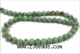 TURQ26 15 inches 4mm round synthetic turquoise with shelled beads